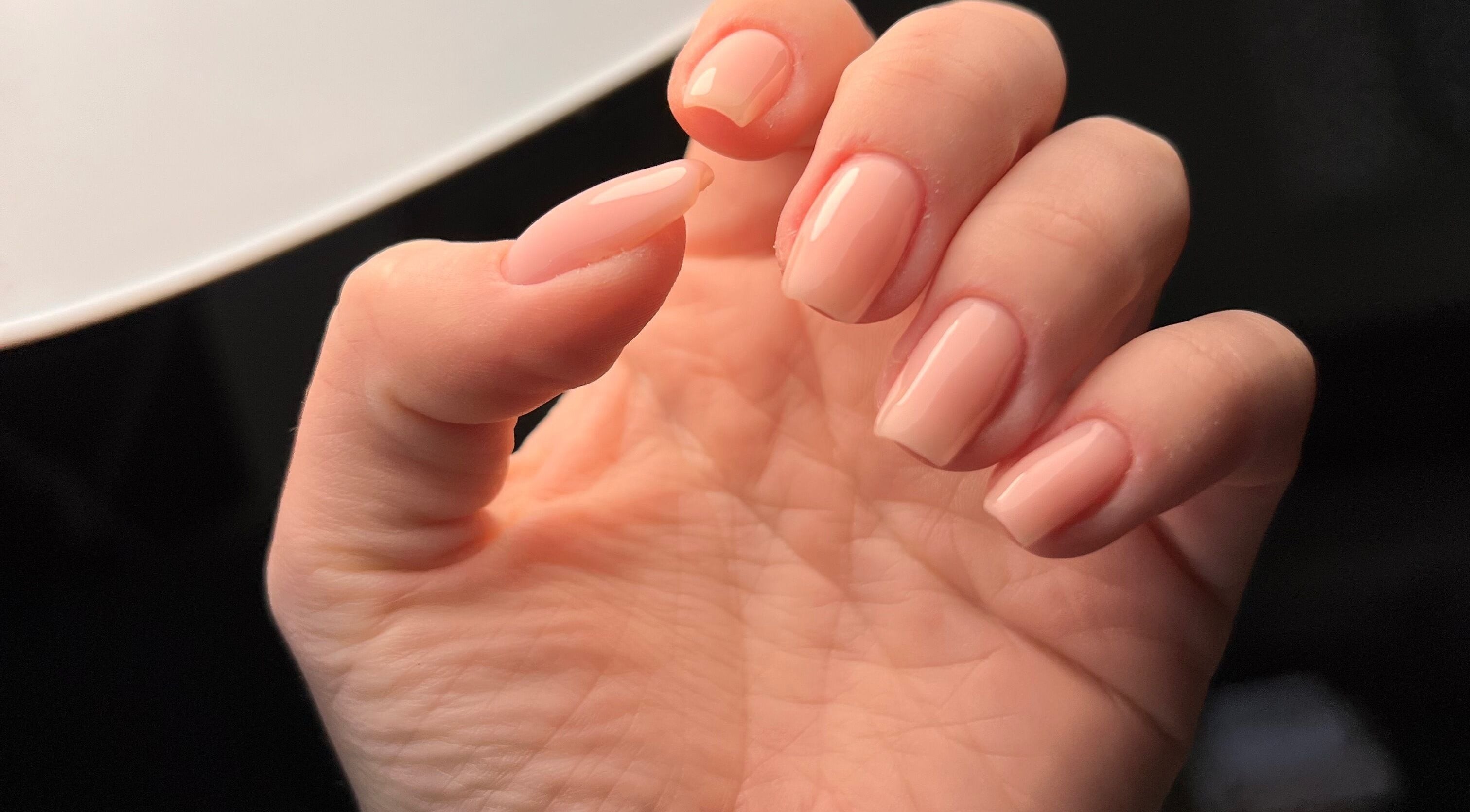 Elegant nude manicure at Nails by Olivia, Calvià, Illes Balears, ES showcasing flawless finish.
