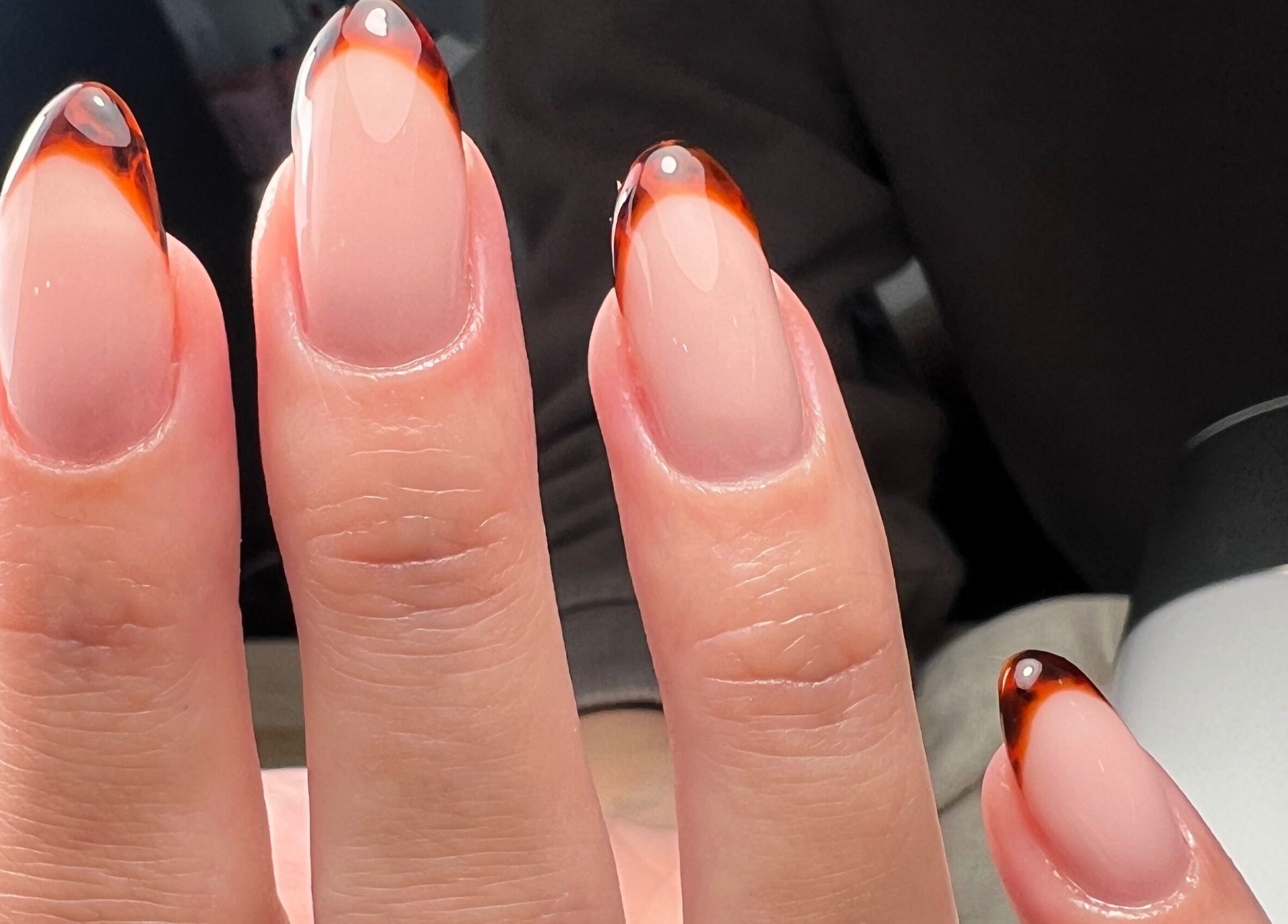 Stylish nail art with amber tips at Nails by Olivia, Calvià, Illes Balears, ES.