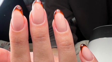 Stylish nail art with amber tips at Nails by Olivia, Calvià, Illes Balears, ES.