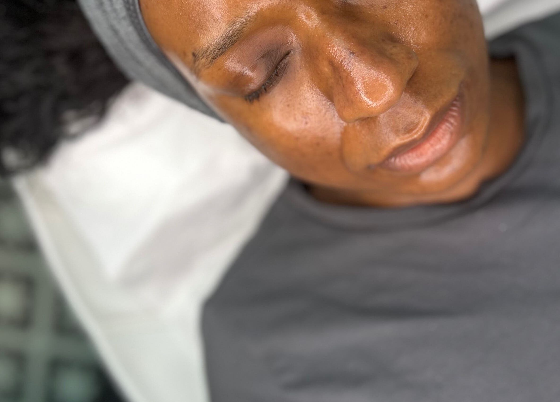 Person relaxing at Studio 224 (Skin Guru) in Northampton, England, GB, enjoying a calming beauty treatment.