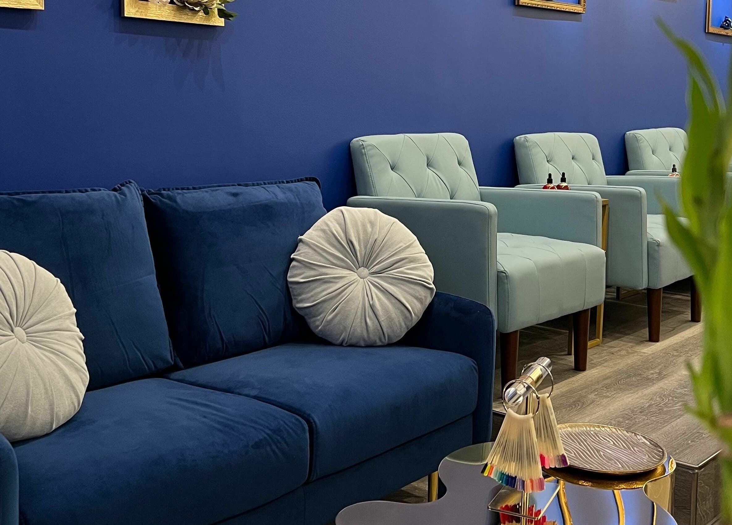 Chic lounge at Mon Cheri Chitown, Chicago, Illinois, US with plush seating and modern decor.