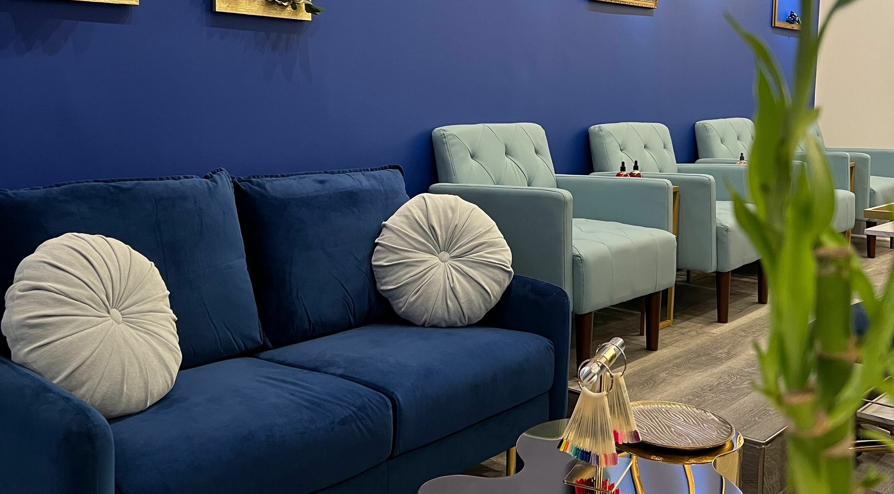 Chic lounge at Mon Cheri Chitown, Chicago, Illinois, US with plush seating and modern decor.