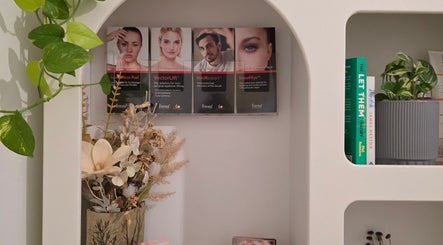 Shelves with beauty products, plants, and decor at Complete Beauty by Cathy, Neutral Bay, New South Wales, AU.