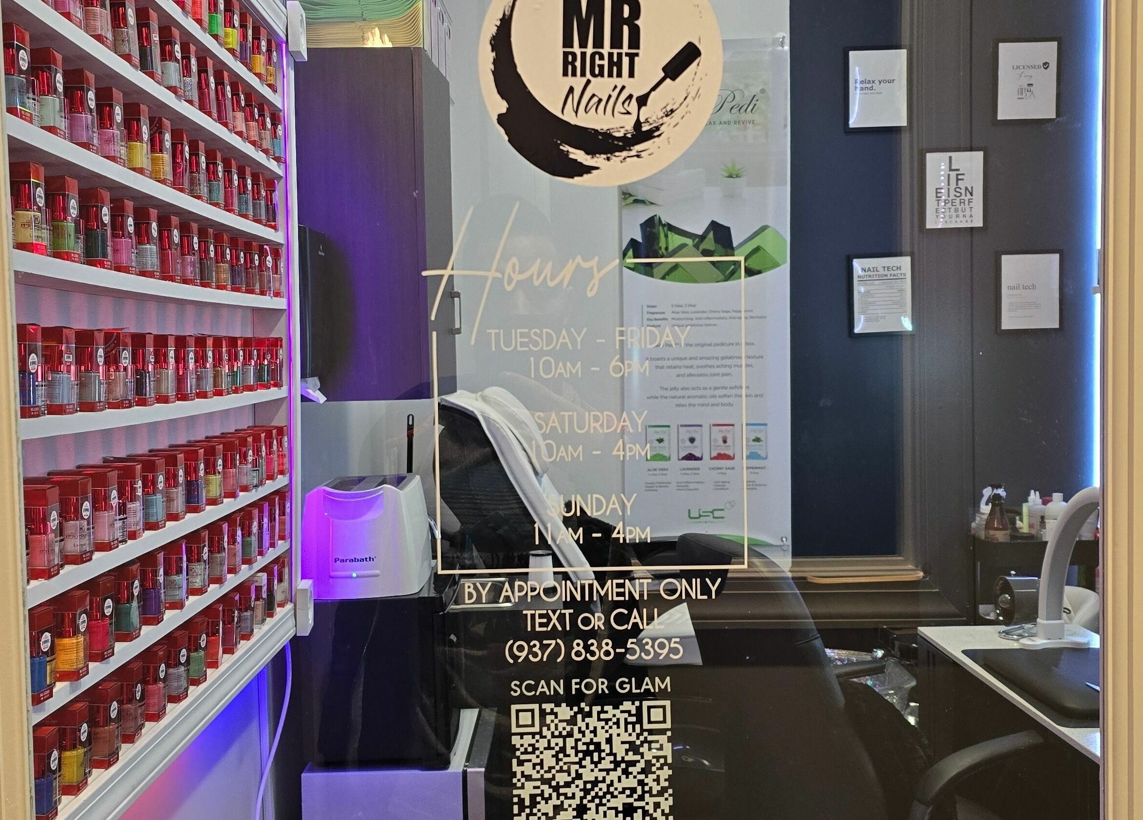 Interior of Mr. Right Nails at Phenix Salon Suites in Columbus, Ohio, with nail polish display and service hours.