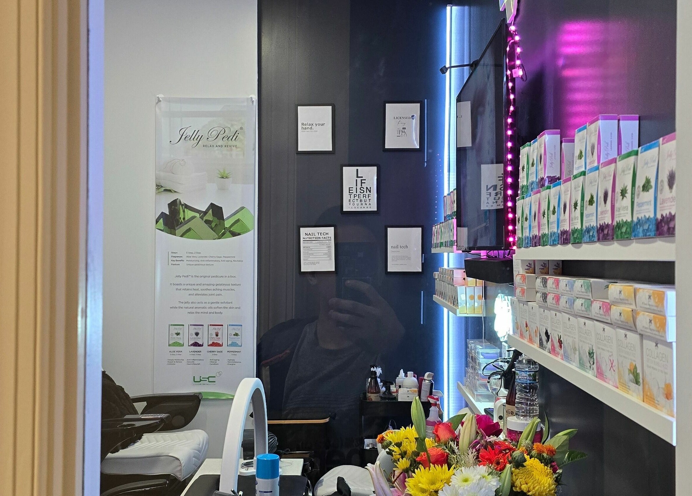 Interior of Mr. Right Nails at Phenix Salon Suites in Columbus, Ohio, US, showcasing products and decor.