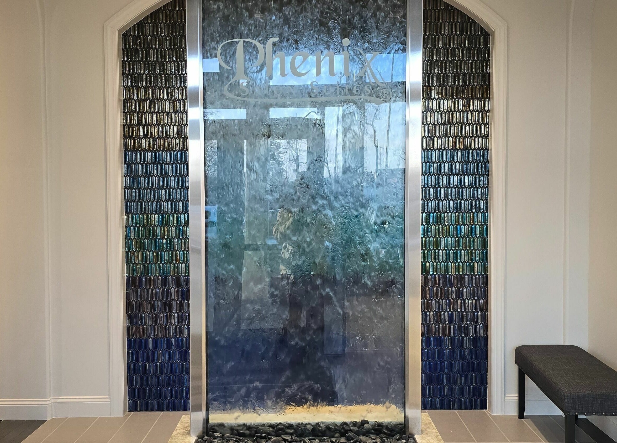 Serene water feature at Mr. Right Nails, Phenix Salon Suites, Columbus, Ohio, US, creating a calming ambiance.