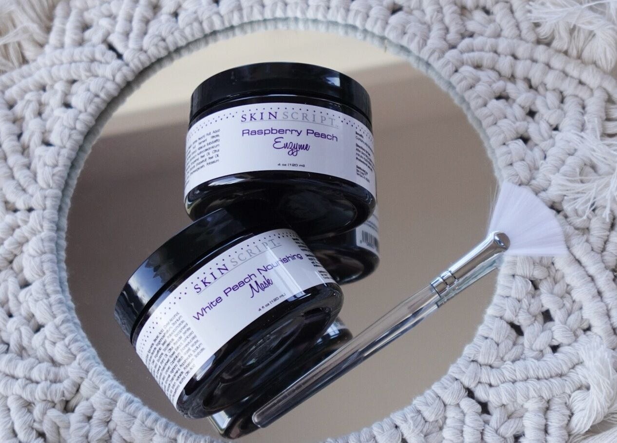 Skin Script jars on macrame at Esthetics by Gwyn, Spring Lake, Michigan, US. Enhance radiance naturally.