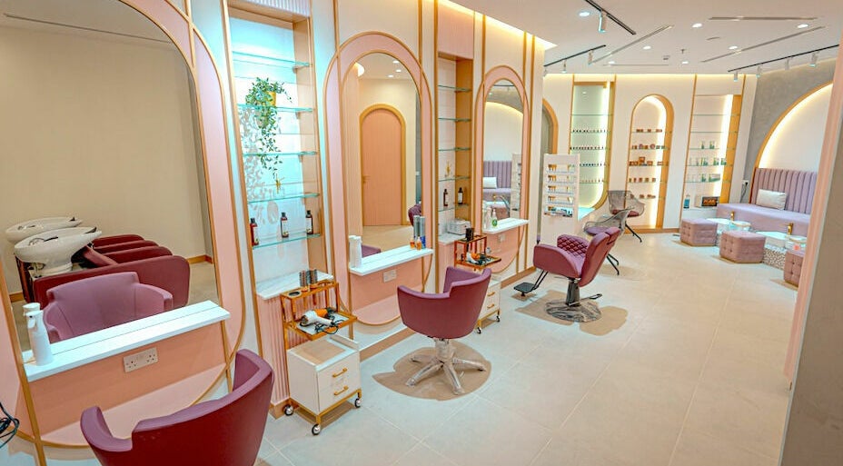 Elegant interior of Larimar Ladies Salon in Sharjah, AE showcasing stylish hair stations and modern decor.