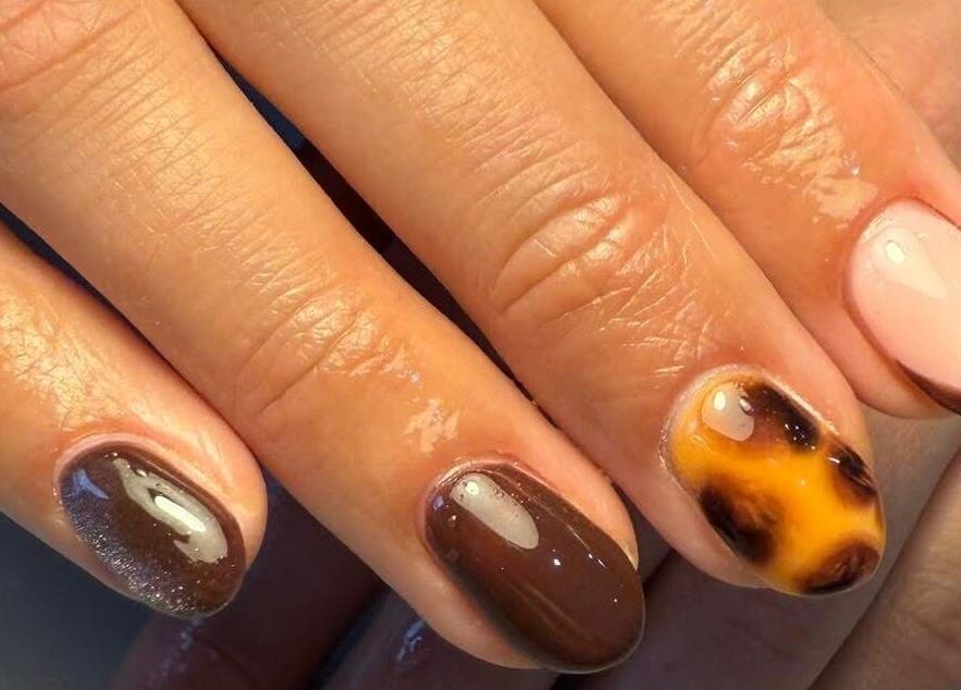 Elegant nail art in autumn tones at The Nail and Lash Lounge Perth, located in Perth, Scotland, GB.