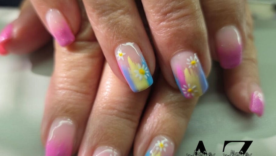 Colorful nail art with daisies at AZ NailZ in Cape Town, Western Cape, ZA.