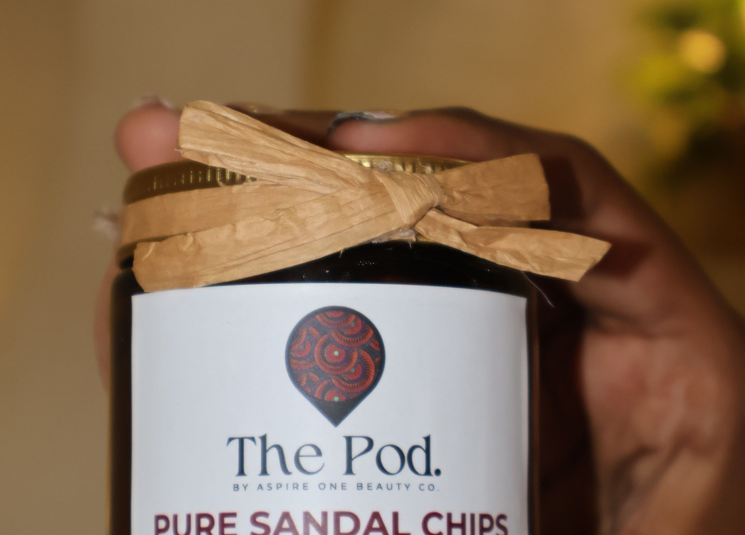 Close-up of Pure Sandal Chips jar from The Pod, Kampala, Central Region, UG.