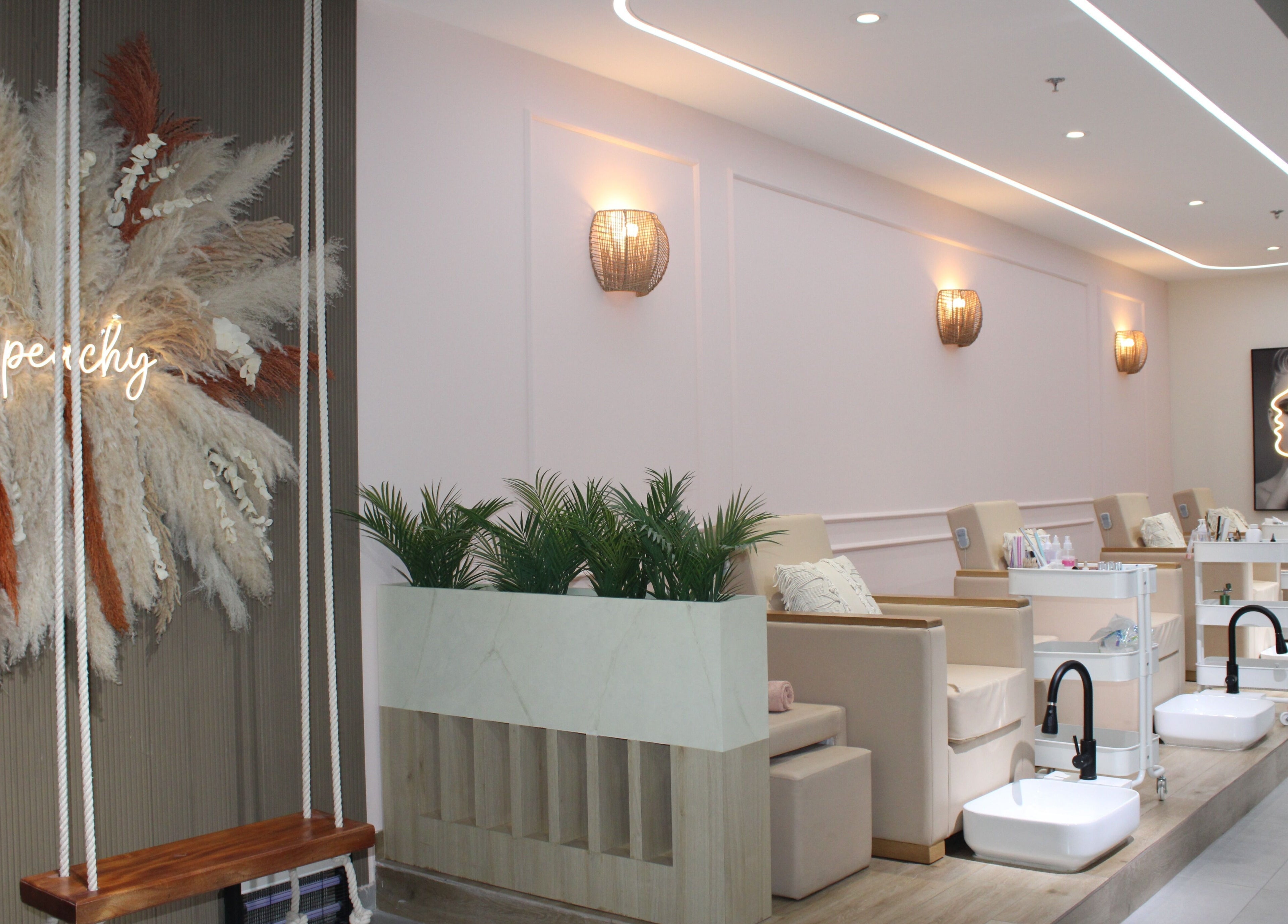 Elegant seating area at Peach Beauty Bar, Dubai, Dubai, AE with chic decor and soothing ambiance.