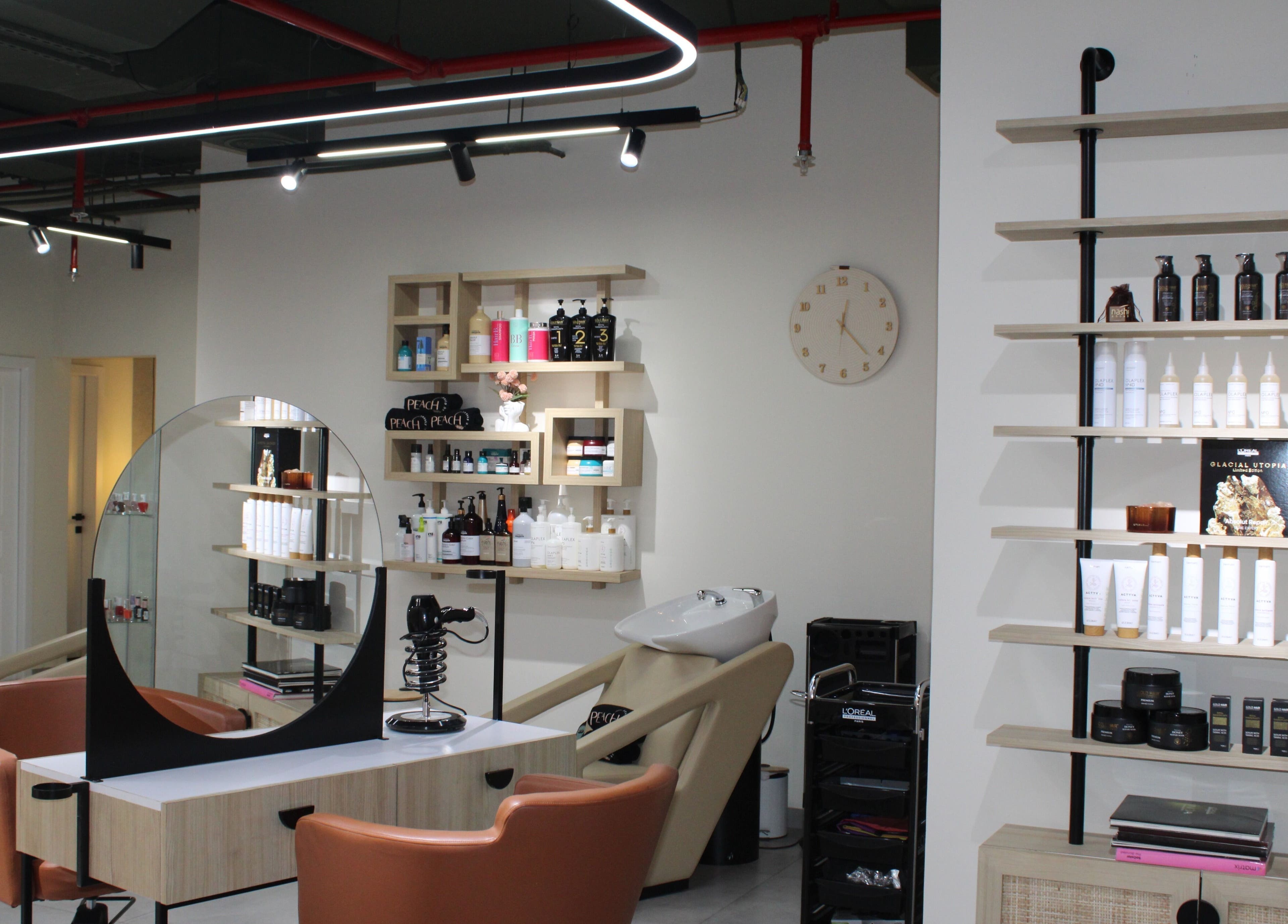 Modern interior of Peach Beauty Bar in Dubai, Dubai, AE showcasing stylish decor and beauty products.