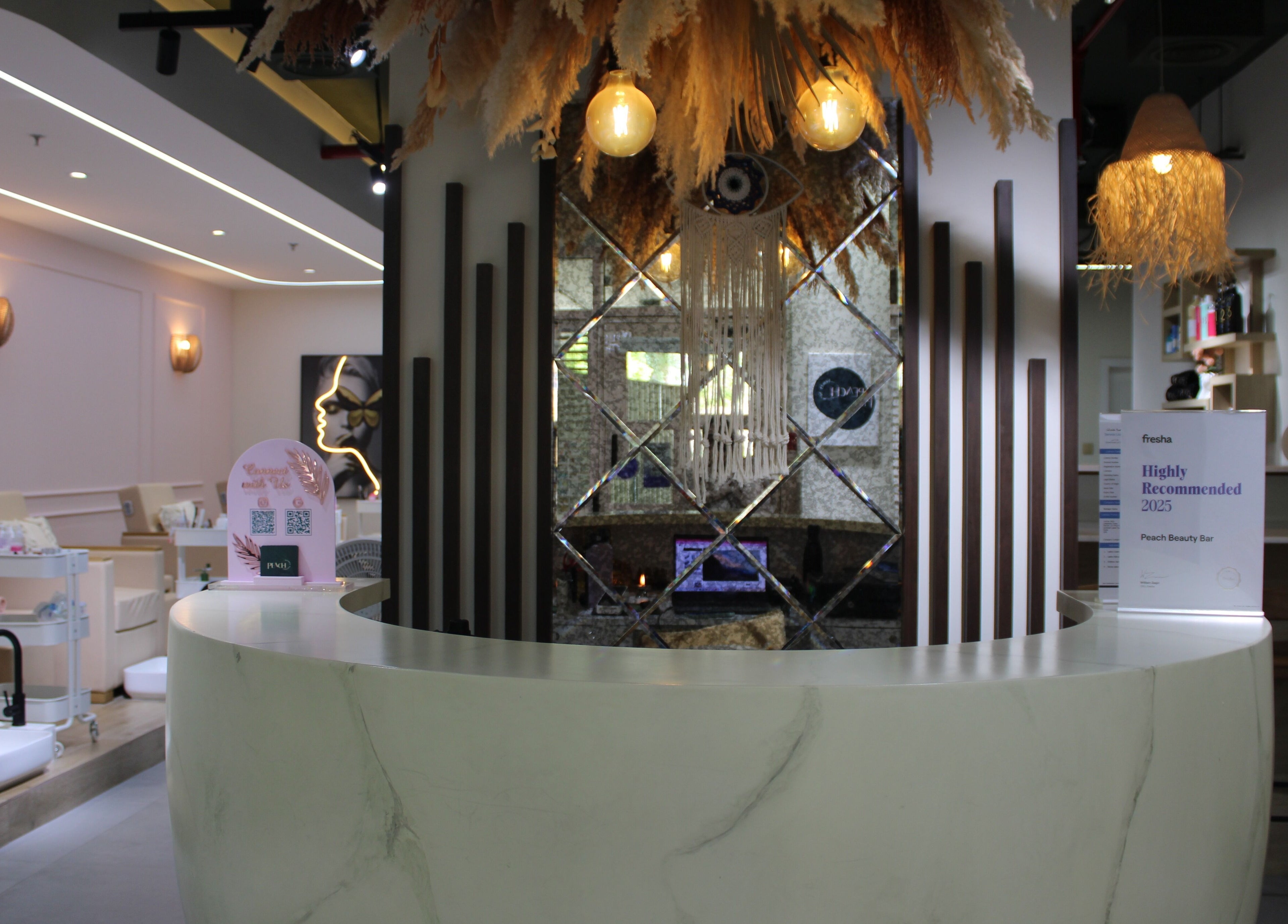 Elegant interior of Peach Beauty Bar in Dubai, Dubai, AE with modern decor and welcoming lounge area.
