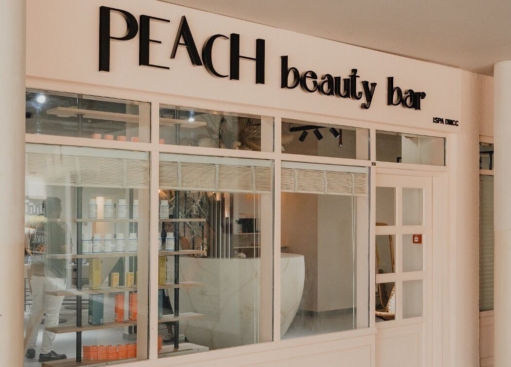 Exterior view of Peach Beauty Bar in Dubai, AE, showcasing its stylish entrance and modern decor.