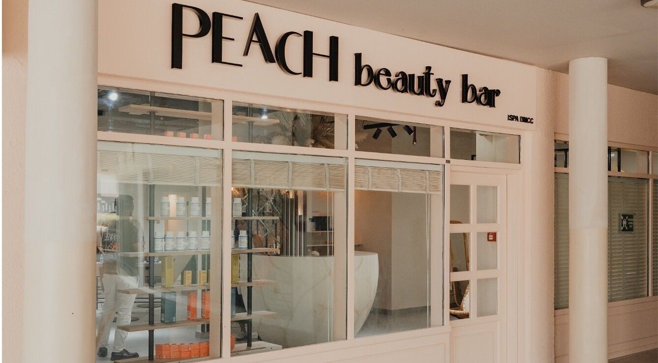 Exterior view of Peach Beauty Bar in Dubai, AE, showcasing its stylish entrance and modern decor.