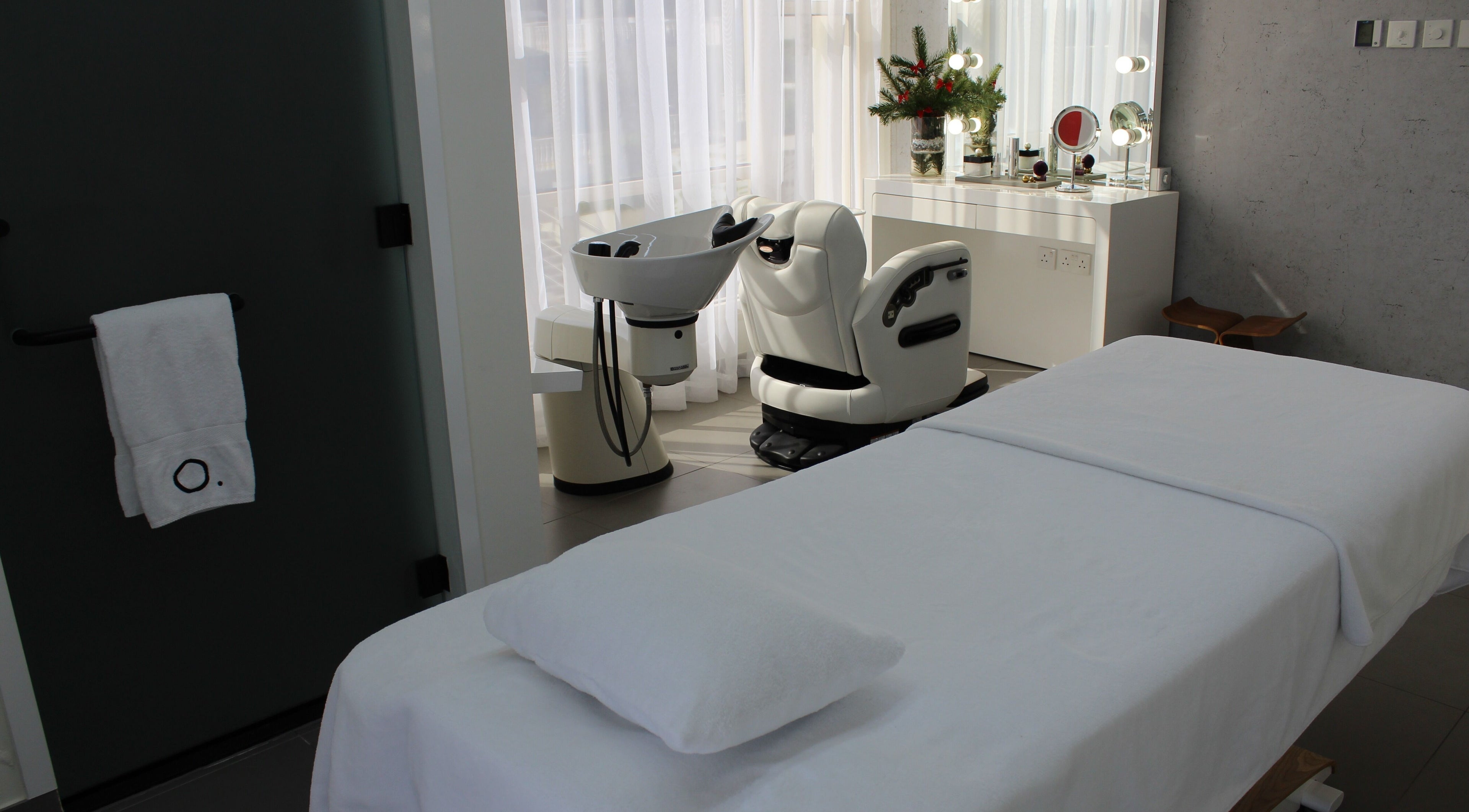 Luxurious treatment area at Buro Beauty Salon, Dubai, Dubai, AE, featuring modern equipment and a relaxing atmosphere.