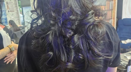 Voluminous curls styled beautifully at Daniel hair and beauty, Slough, England, GB.