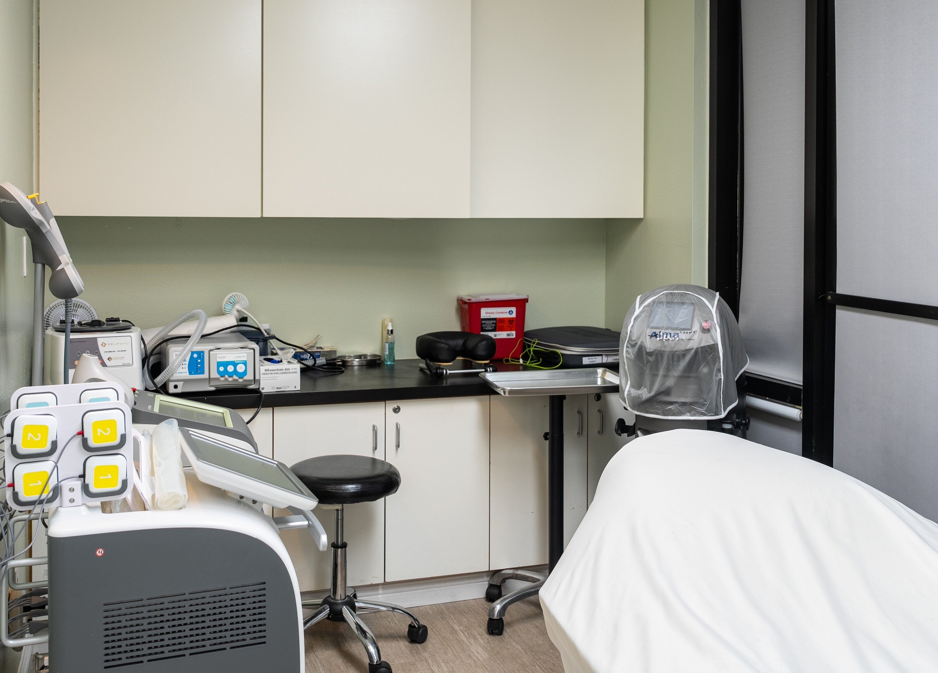 Modern therapy room at Bamboo Leaf Holistic Medi Spa, Upland, California, US, featuring advanced equipment.