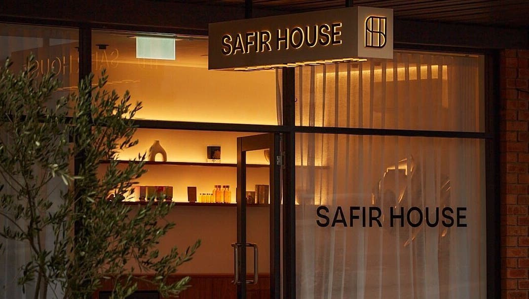 Cozy entrance of Safir House in Merimbula, New South Wales, AU, with elegant lighting and decor.