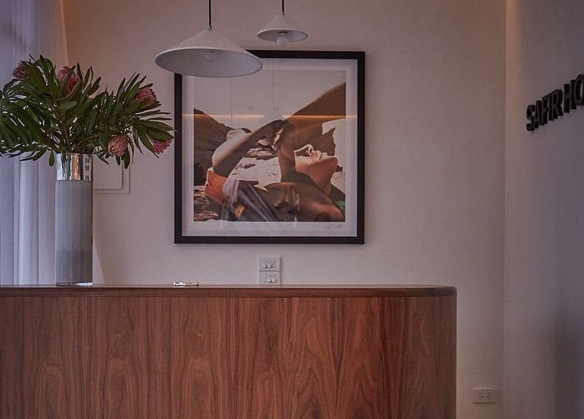 Elegant reception area at Safir House in Merimbula, New South Wales, AU with artwork and decor.