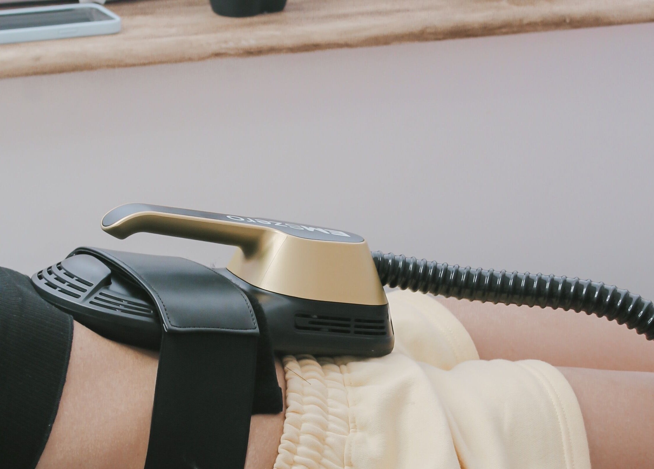 Body contouring session at Fallon Physique in Bordon, England, GB featuring advanced toning equipment.