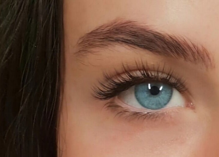 Close-up of blue eye with lush lashes at Crystal Spa, Perth, Western Australia, AU.