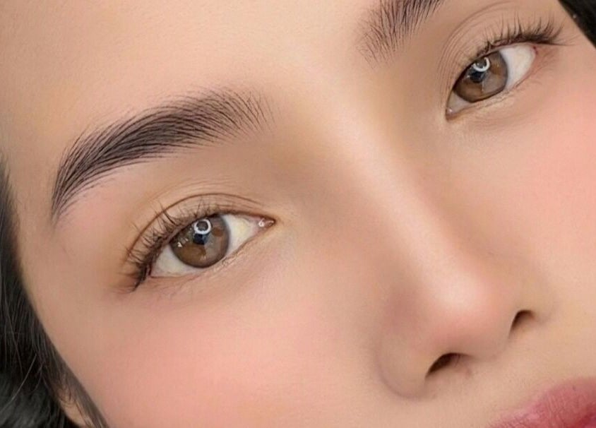 Close-up of glowing skin and elegant eyebrows at Crystal Spa, Perth, Western Australia, AU.