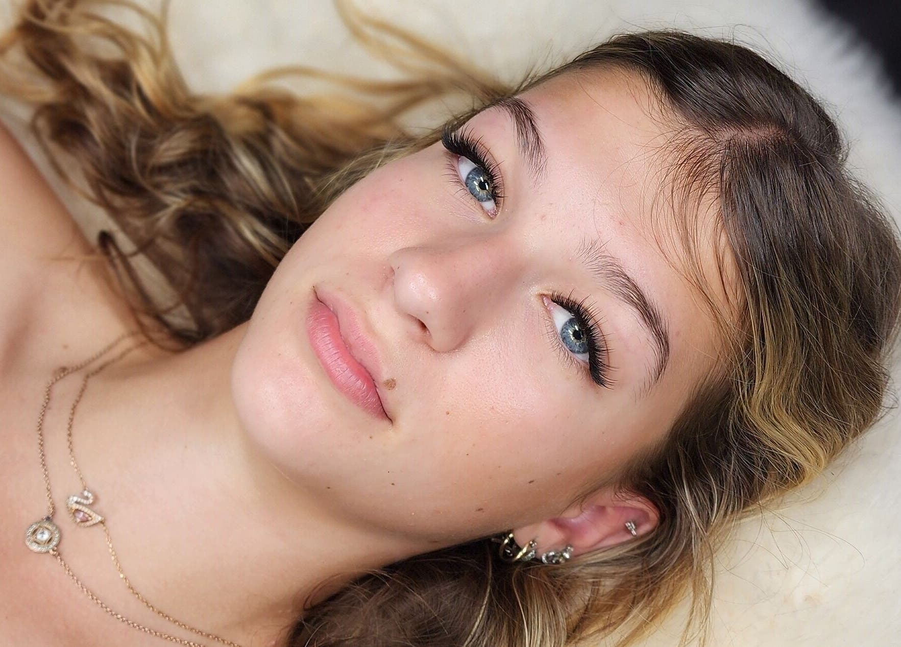 Relaxed woman enjoying a calming spa experience at Crystal Spa, Perth, Western Australia, AU.