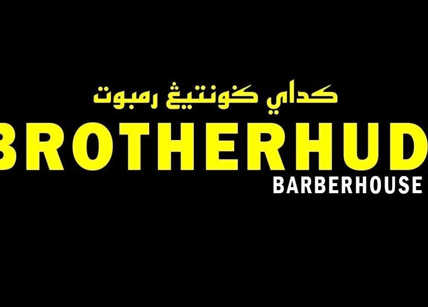Bold sign of BROTHERHUD BARBERHOUSE BM in Bukit Mertajam, Pulau Pinang, MY with striking yellow text.