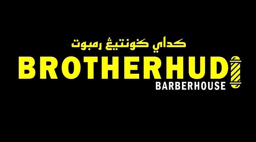 Bold sign of BROTHERHUD BARBERHOUSE BM in Bukit Mertajam, Pulau Pinang, MY with striking yellow text.