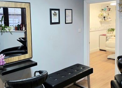 Elegant beauty salon interior at Amber Beauties in Goffs Oak, England, featuring sleek design and modern facilities.