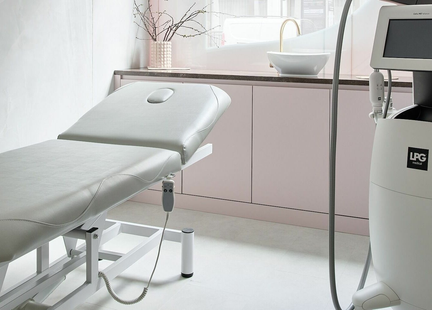 Victoria Aesthetics treatment room with luxurious equipment in London, England, GB, offering wellness therapies.