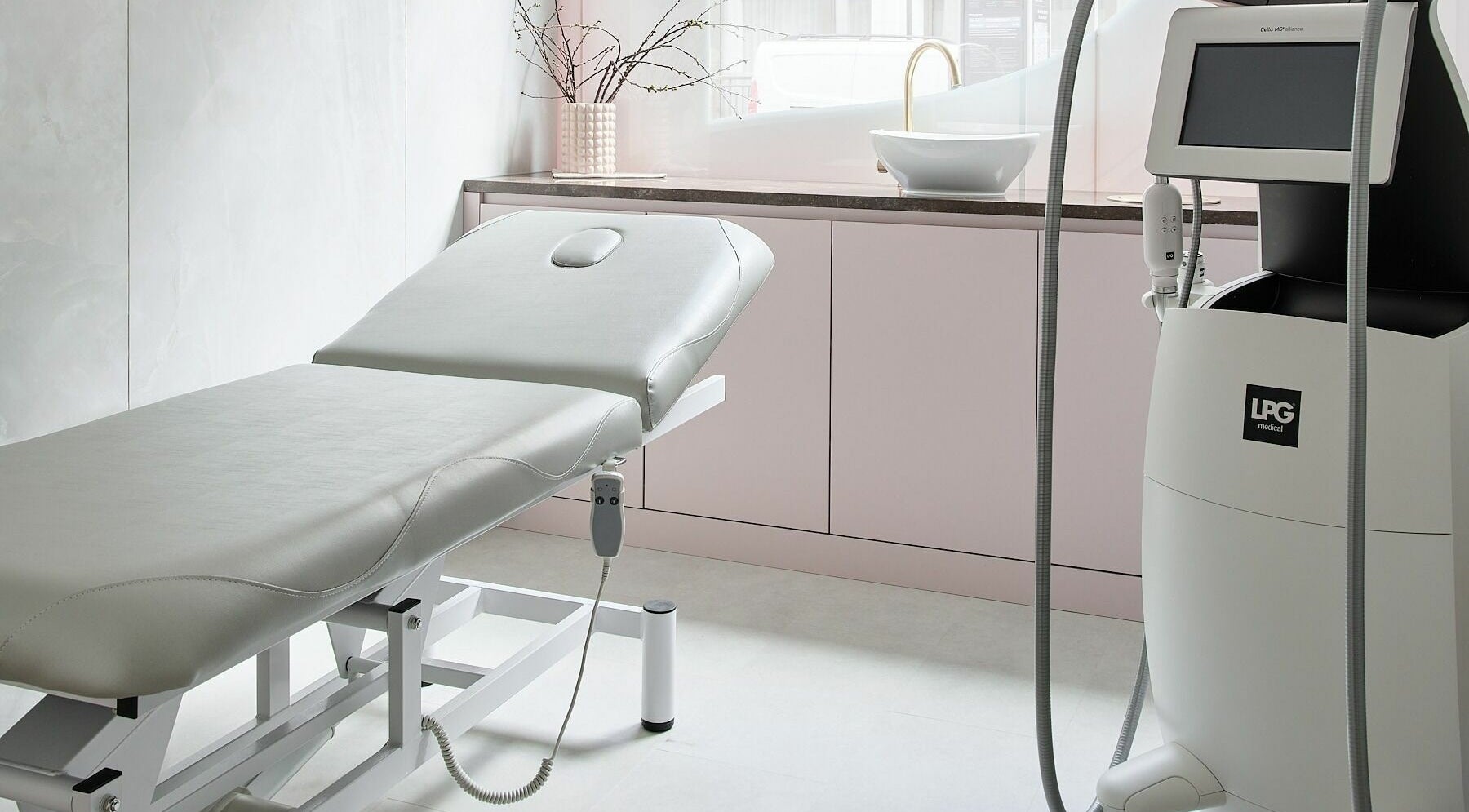 Victoria Aesthetics treatment room with luxurious equipment in London, England, GB, offering wellness therapies.