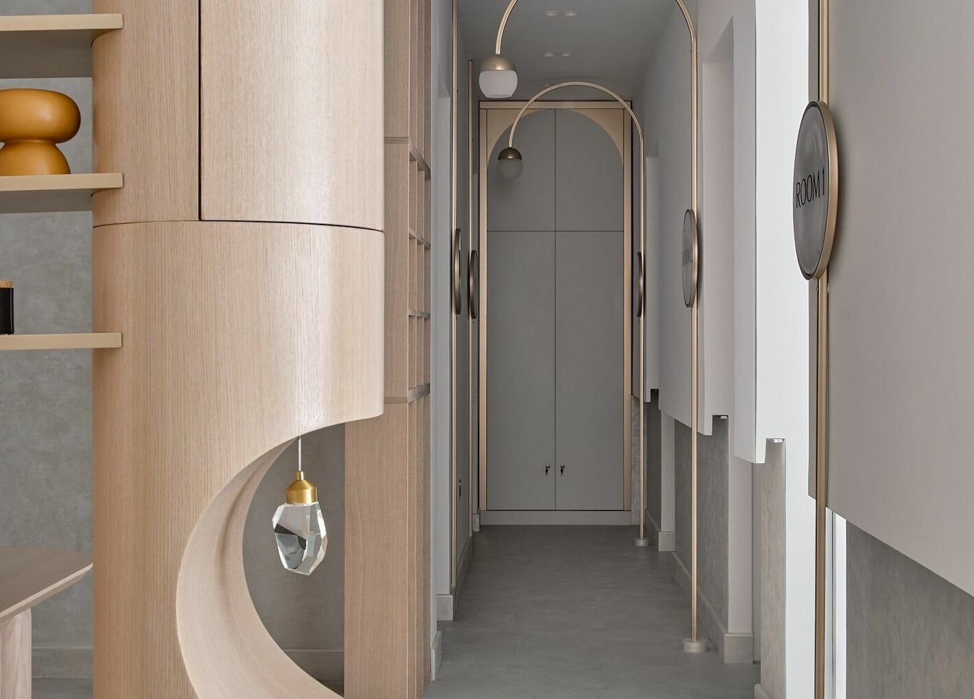 Elegant modern corridor at Victoria Aesthetics, London, England, GB showcasing sleek design and soft lighting.