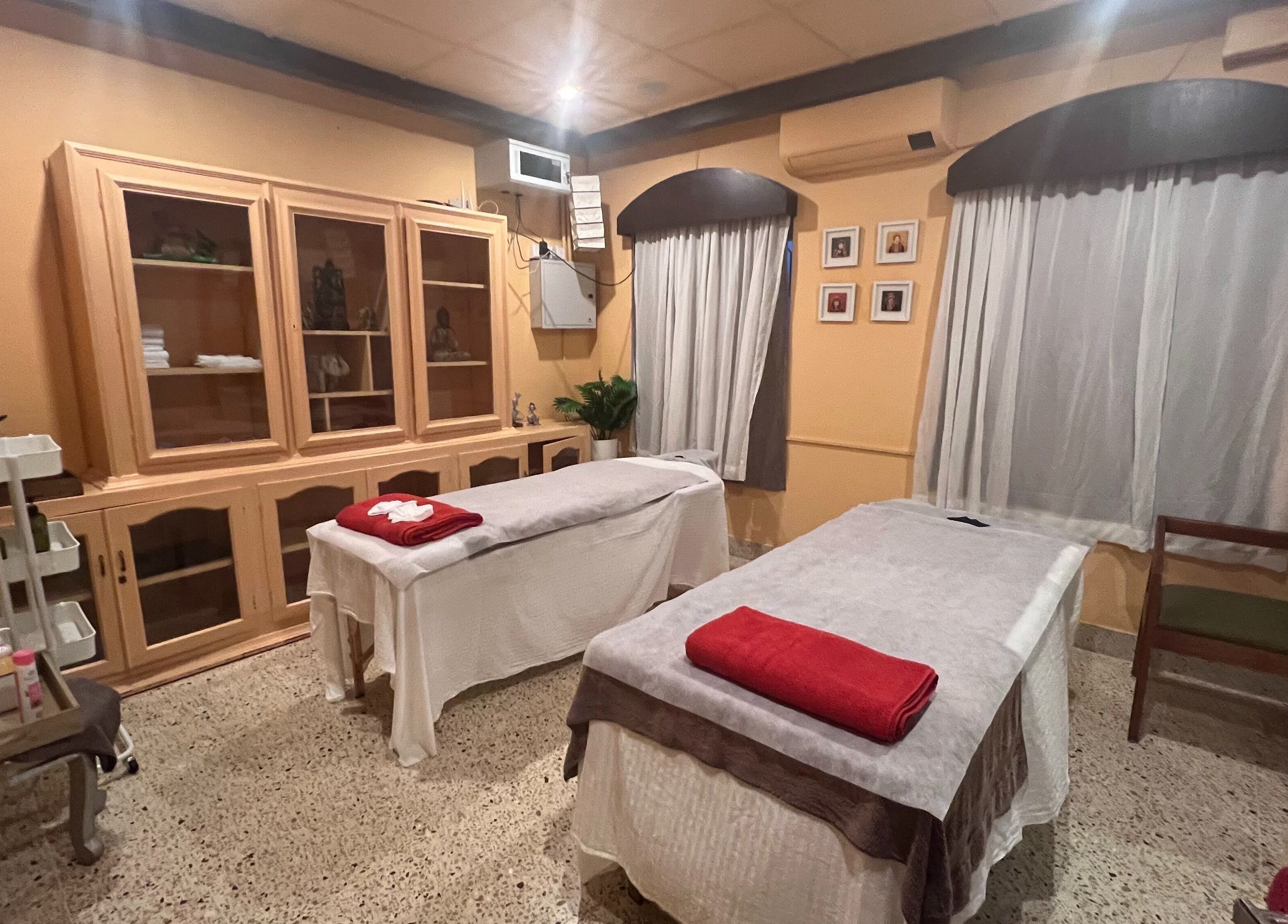 Relaxing massage room at Praana Ayur Spa by Sarwaa, Varkala, Kerala, IN with two massage tables.