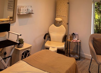 Cozy beauty room at Beauty By Lucy Clare, Craven Arms, England, GB with chair and relaxing decor.