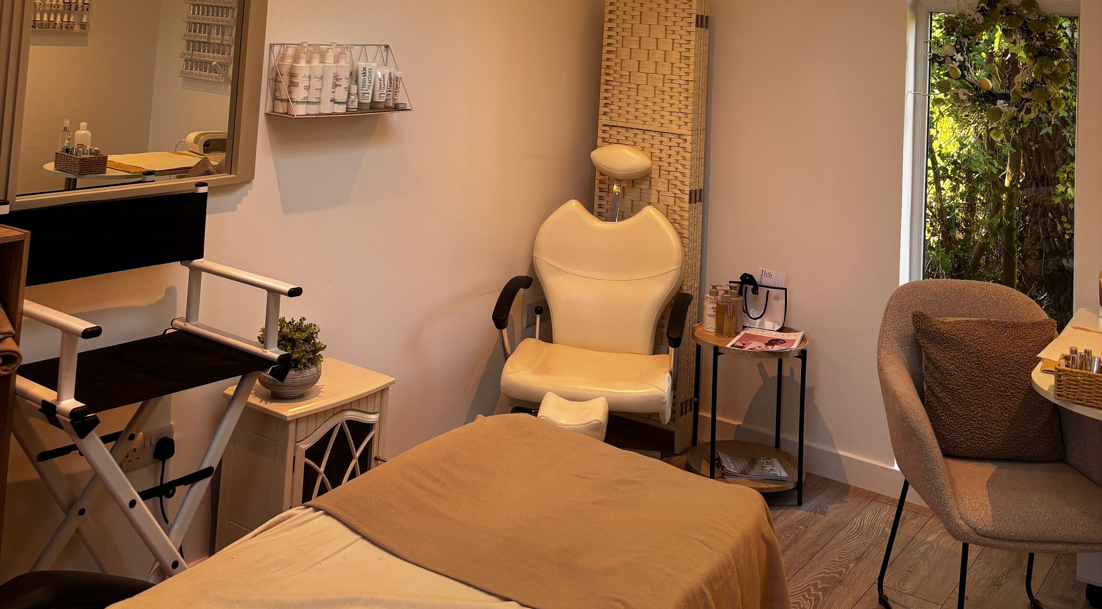 Cozy beauty room at Beauty By Lucy Clare, Craven Arms, England, GB with chair and relaxing decor.