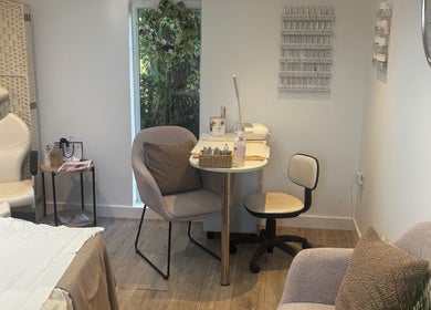 Bright, modern treatment room at Beauty By Lucy Clare in Craven Arms, England, GB. Features comfortable seating.