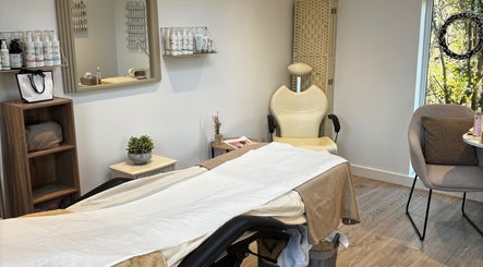 Calm treatment room at Beauty By Lucy Clare, Craven Arms, England, GB with a well-prepared massage table.