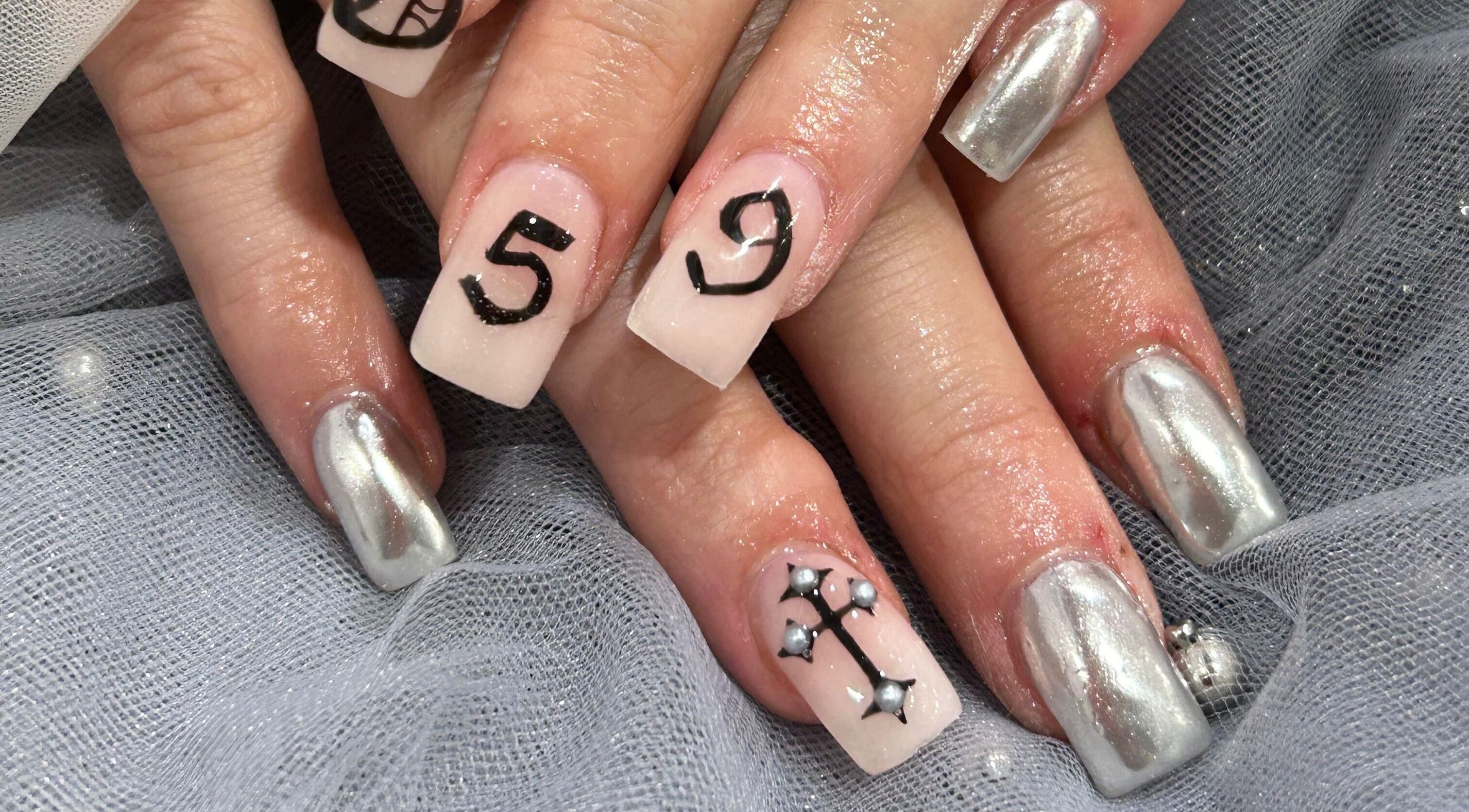 Stylish nail art at Coco Nails and Beauty in Auckland, Auckland, NZ with silver and unique designs.