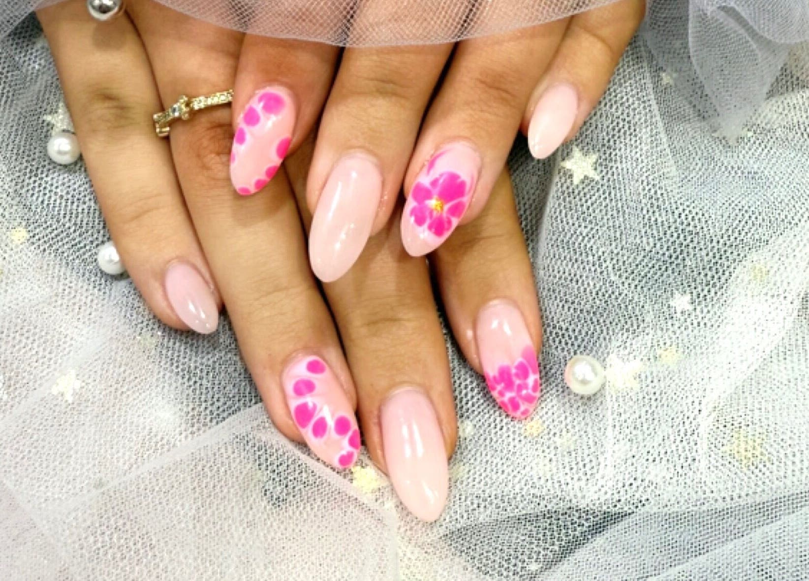 Beautiful nail art with pink floral design at Coco Nails and Beauty, Auckland, Auckland, NZ.