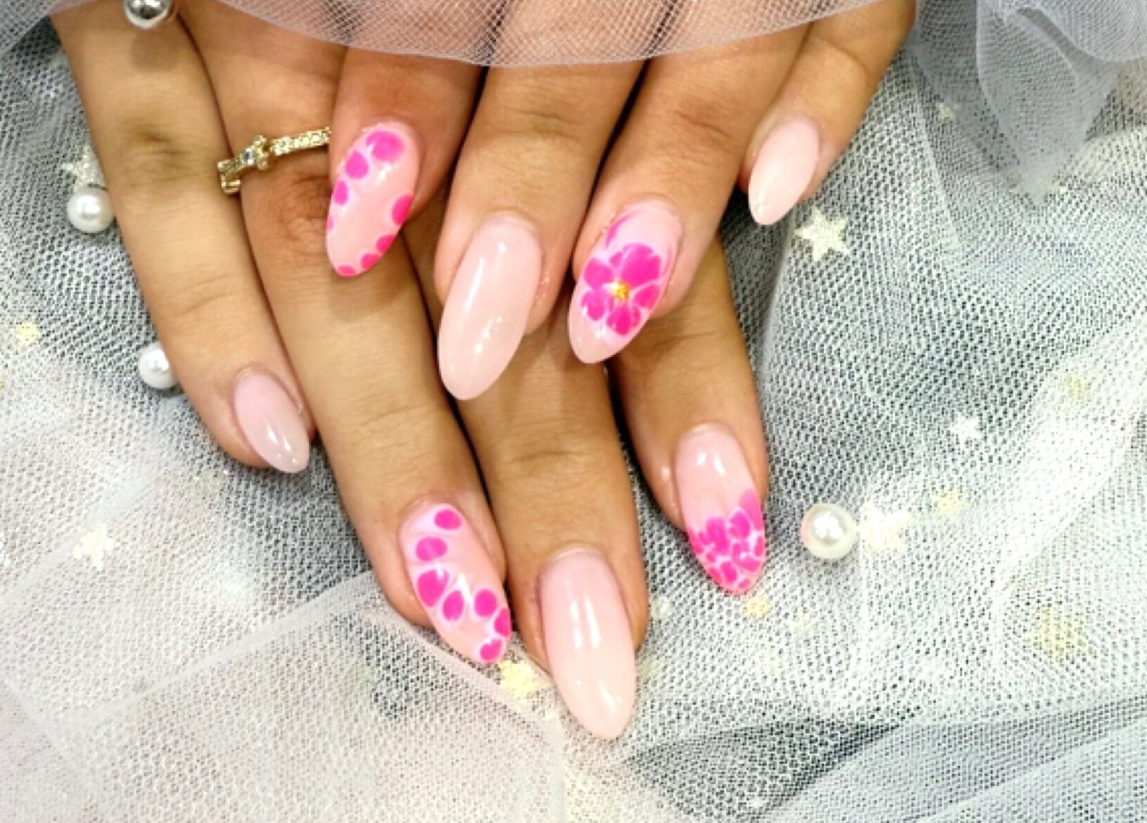 Beautiful nail art with pink floral design at Coco Nails and Beauty, Auckland, Auckland, NZ.