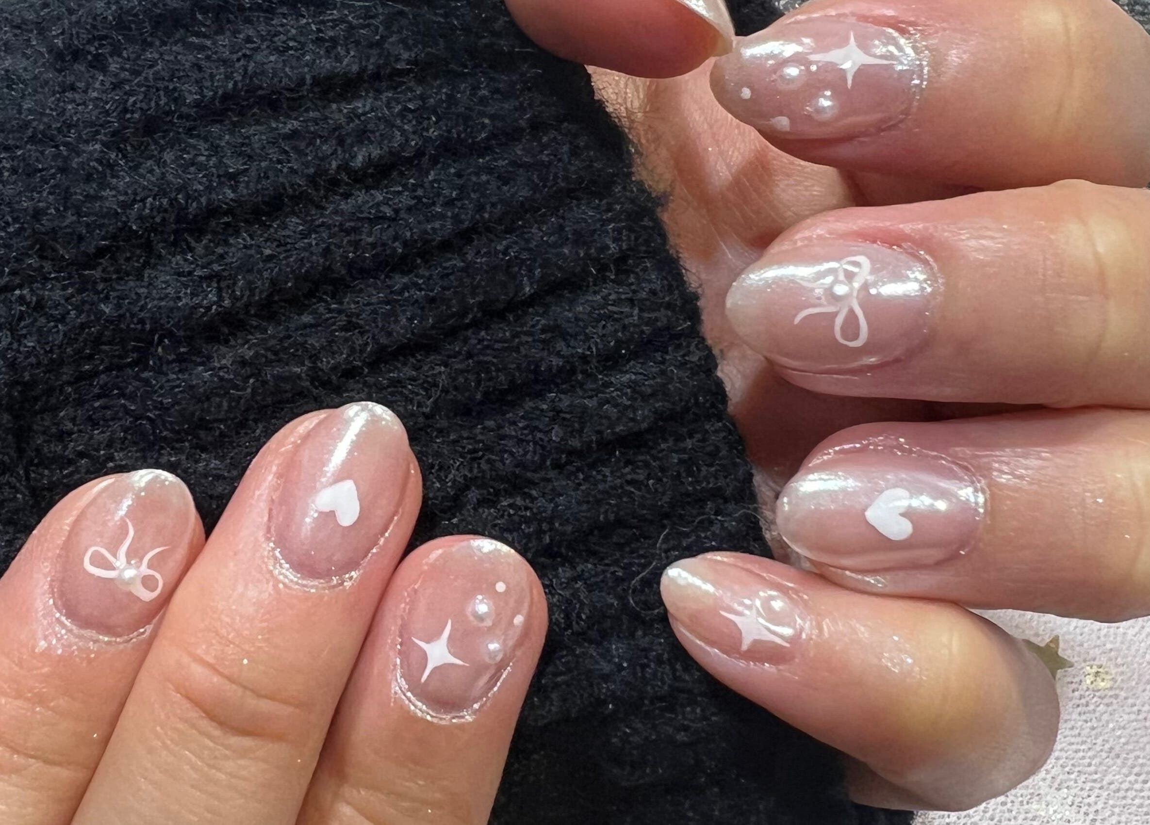 Intricate nail art at Coco Nails and Beauty, Auckland, Auckland, NZ, featuring elegant designs and shimmering details.
