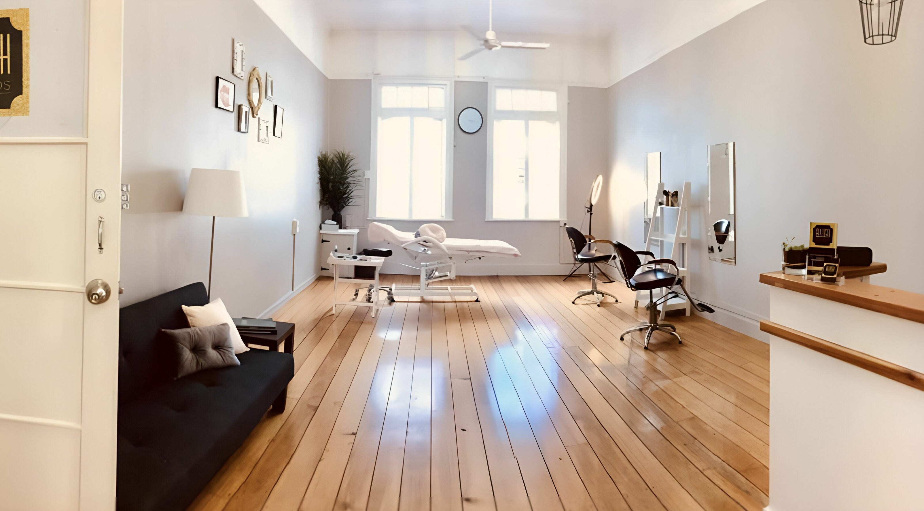 Elegant interior of B.lush Studios, Toowoomba City, Queensland, AU with salon chairs and treatment bed.