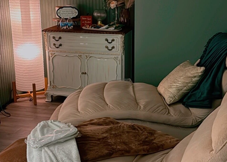 Relaxing space at Meraki and Co Salon LLC, Greer, South Carolina, US, featuring a plush chair and soft lighting.