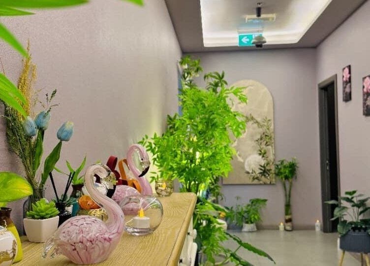 Essence Healing Spa L.L.C. (Branch) in Dubai, Dubai, AE features a lush, calming corridor with plants and decor.