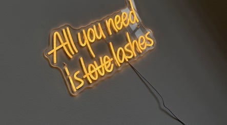 Neon sign at The Beauty Geek UK in Paisley, Scotland, GB reads 'All you need is love lashes'.