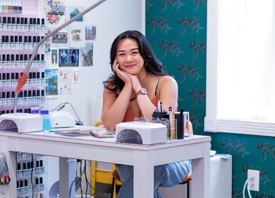 Smiling nail artist at Eggkeys! Nails by Thea C.K., Salt Lake City, Utah, US inviting you in.
