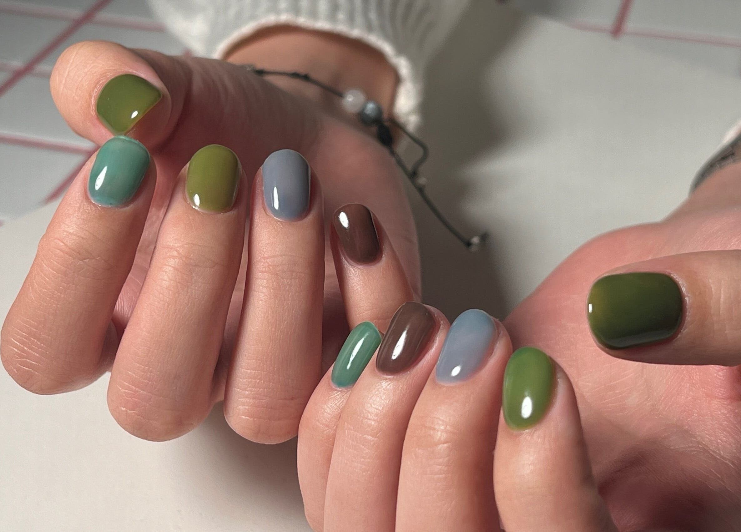 Stylish green and blue nails at Eggkeys! Nails by Thea C.K., Salt Lake City, Utah, US.